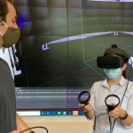 Student working with VR headset at VEMS lab, UBC